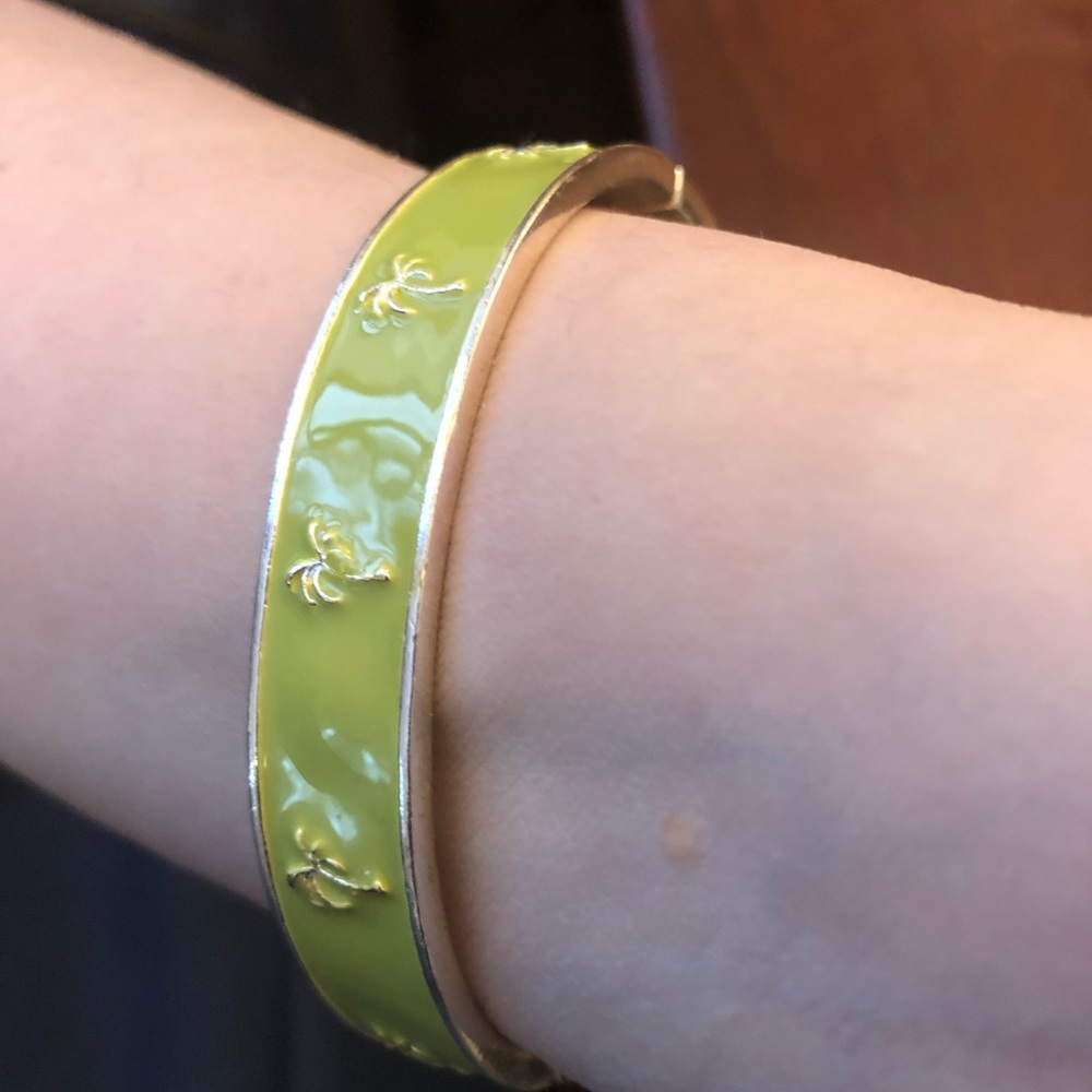 Pre-loved lime green with palm trees hinged bangle bracelet.